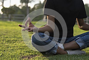 Closeup of hands woman doing yoga relax outdoor, female fitness pose focus and meditation for fitness club lifestyle outdoor