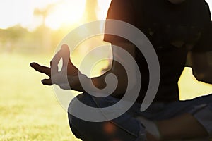 Closeup of hands woman doing yoga relax outdoor, female fitness pose focus and meditation for fitness club lifestyle outdoor