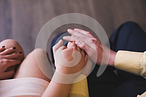 Closeup of hands of young couple