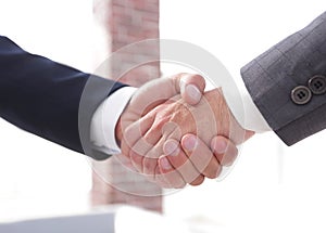 Closeup.handshake of business partners