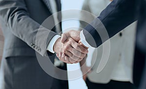 Closeup of handshake of business partners