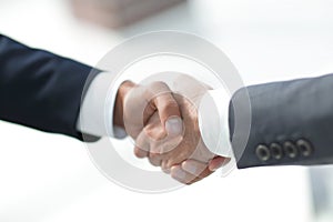 Closeup.handshake of business partners