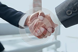 Closeup.handshake of business partners