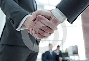 Closeup of handshake of business partners