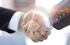 Closeup.handshake of business partners