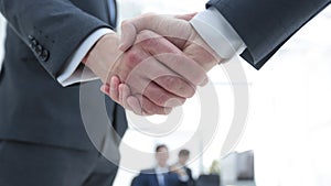 Closeup of handshake of business partners