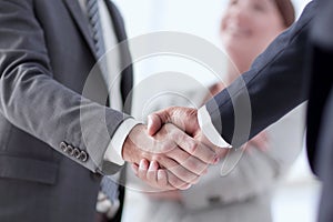 Closeup of handshake of business partners