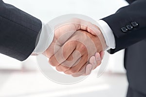 Closeup.handshake of business partners