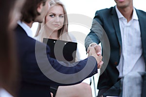 Closeup.handshake of business partners.the concept of cooperation