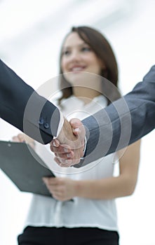 Closeup.handshake of business people