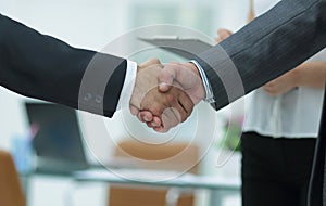 Closeup.handshake of business people