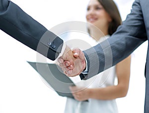 Closeup.handshake of business people