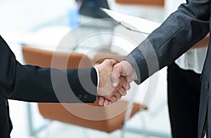 Closeup.handshake of business people