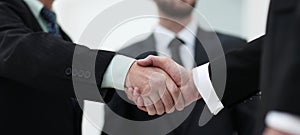 Closeup handshake proven business partners