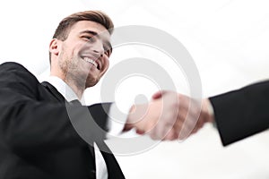 Closeup handshake proven business partners