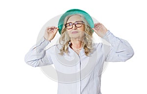 Closeup of happy stylish senior woman in business glasses and summer hat . Positive life living of elderly people. Healthy