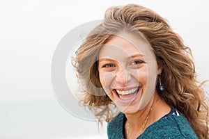 Closeup of happy young smiling woman