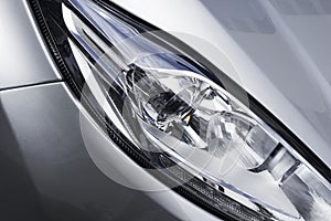 Closeup head light of modern car