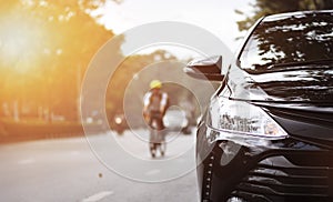 Closeup headlights of black car.