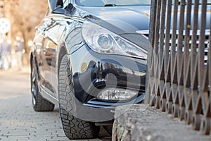 Closeup headlights of car on the street