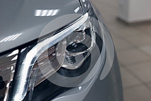 Closeup headlights of a modern car