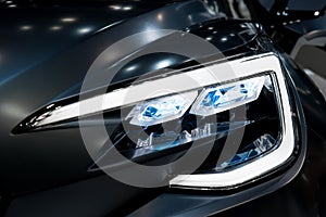 Closeup headlights of modern car