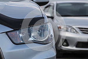 Closeup headlights . Modern car. Concept of expensive auto