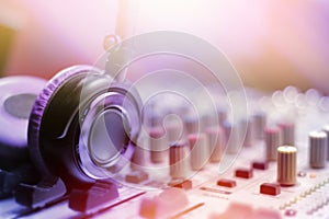 Closeup of headphones on music mixer for dj
