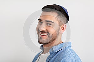 Closeup headshot portrait of smiling jewish man in kippa