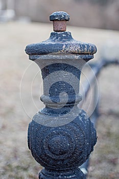 Closeup of headstone ornament at an old delapidated looking graveyard on a gray gloomy day in Upstate New York