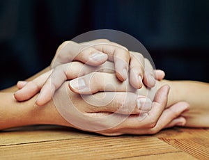 Closeup, healing and holding hands with love, trust and hope in a crisis, empathy and support. Zoom, people and friends