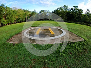 Closeup of helipad for landing helicopters on asphalt ground