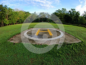 Closeup of helipad for landing helicopters on asphalt ground