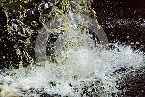 Closeup and high speed capture of a waterfall in Connecticut