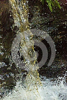 Closeup and high speed capture of a waterfall in Connecticut