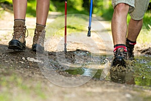 Closeup of hiker legs wearing trekking boots