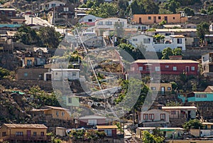 Closeup of hill flank filled with houses and stairs, Coquimbo, Chile