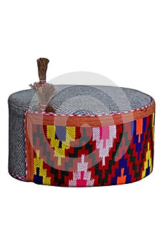 Closeup of a Himachali traditional hand woven cap on a white background