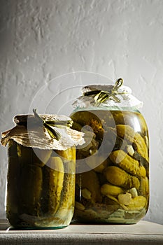 closeup homemade canned cucumbers in glass jars