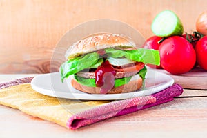 Closeup homemade hamburger fresh vegetables