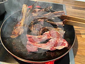 Closeup of a homemade lambchops in a pan