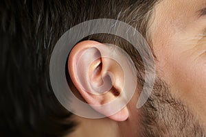 Closeup of a human ear on a men.