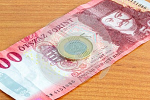 Closeup on 200 Hungarian forint coin on 500 Hungarian forint note