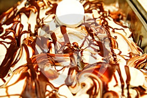 Closeup of Ice cream in the dishes in the fridge.