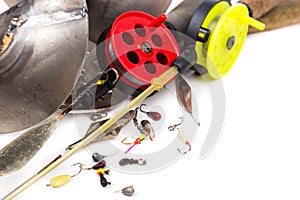 Closeup ice fishing tackles and equipment