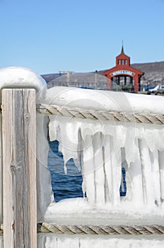 Closeup of icy rope barrier in the harbor of Seneca Lake