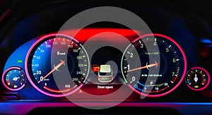 Closeup of illuminated car dashboard
