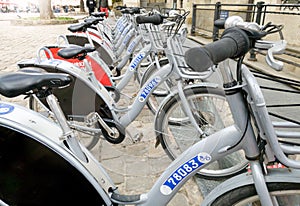 Closeup image bicycle rent parking on the old town aquare