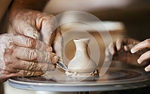 Closeup image ceramist man hands