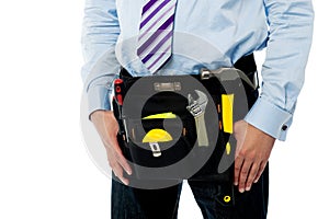 Closeup image of handyman tool belt